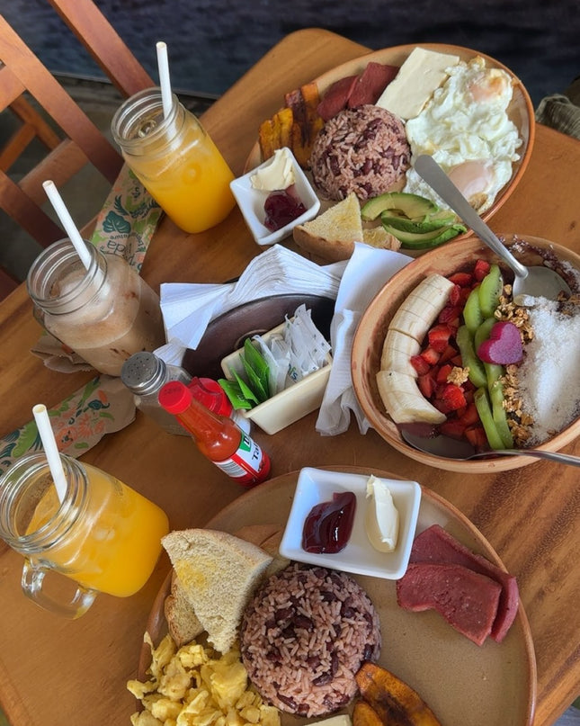 Costa Rica meal with acai bowl, rice and drinks