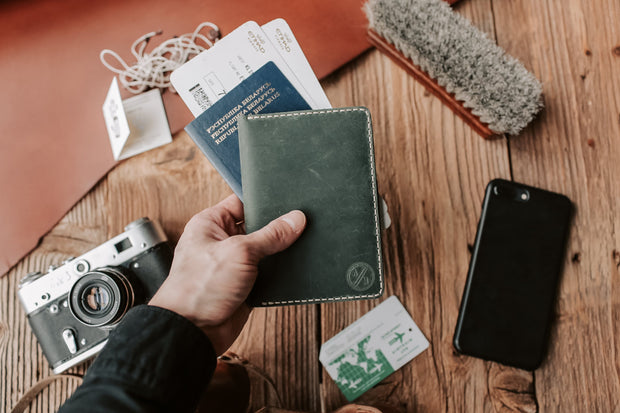 Hand holding passport